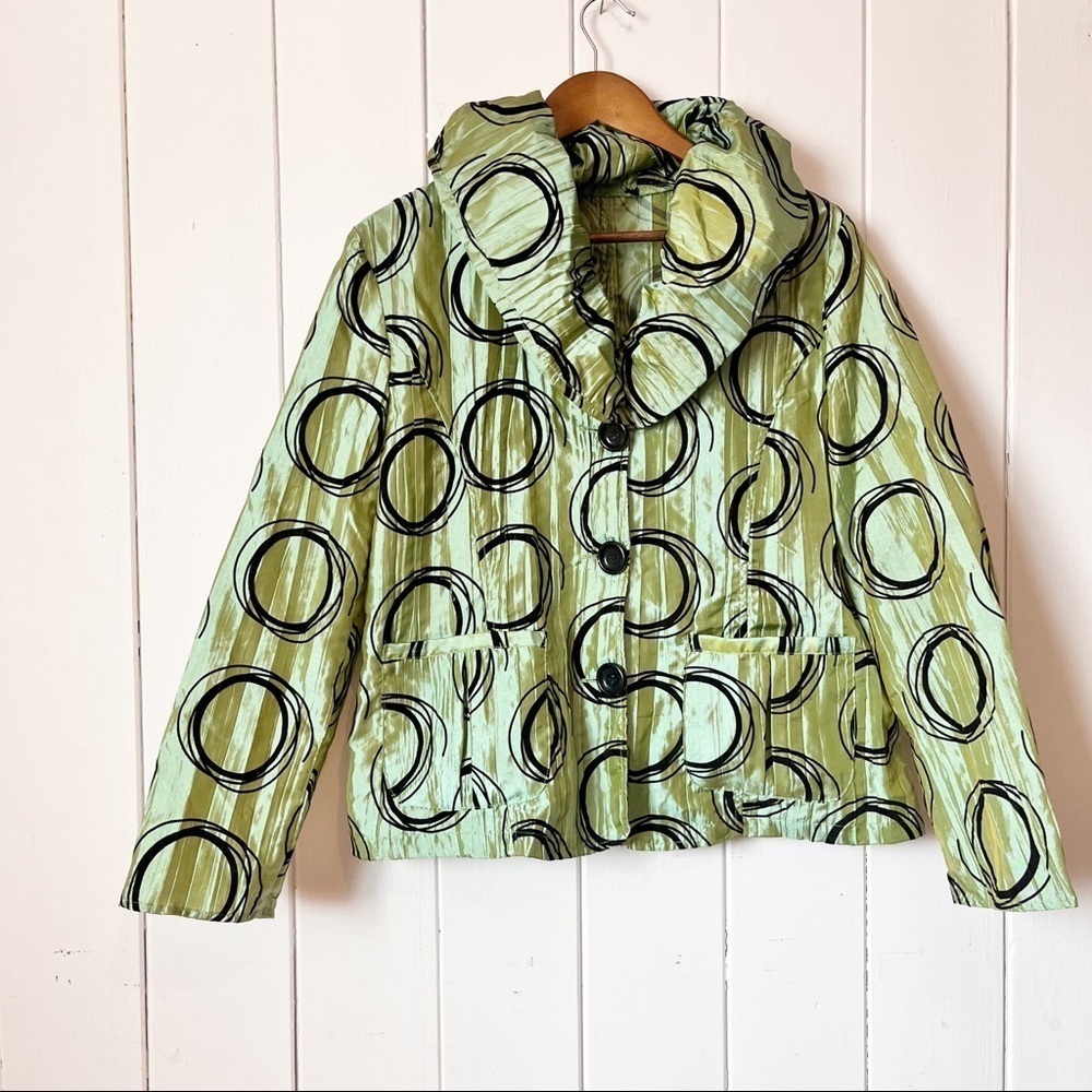 Green puffy collared Crinkle coat.